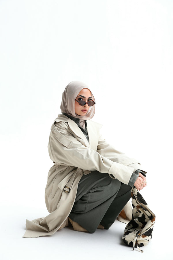 Trendy trench coat in beige