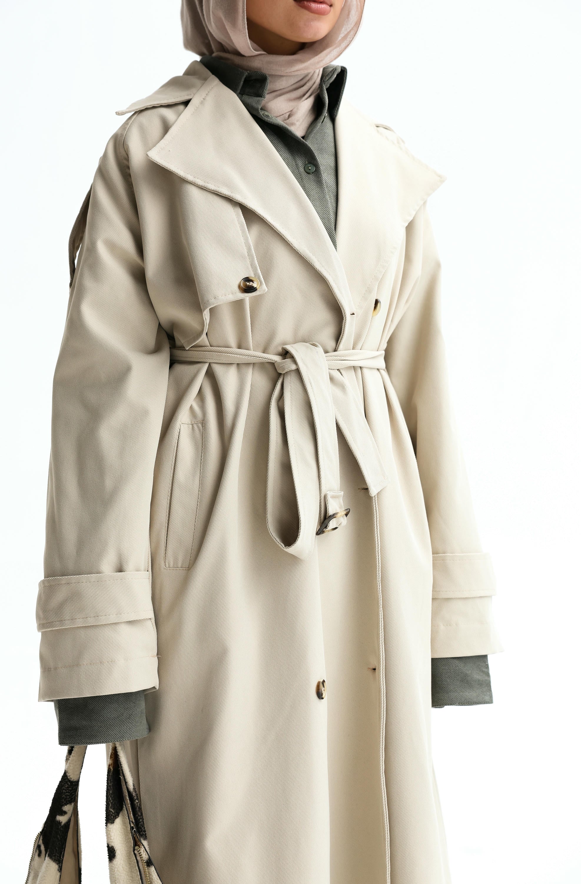 Trendy trench coat in beige