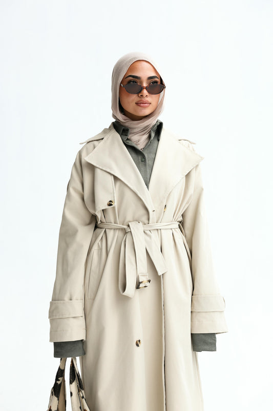 Trendy trench coat in beige